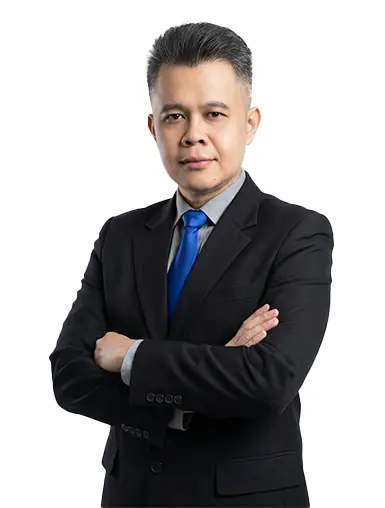 Man with arms crossed wearing corporate suit